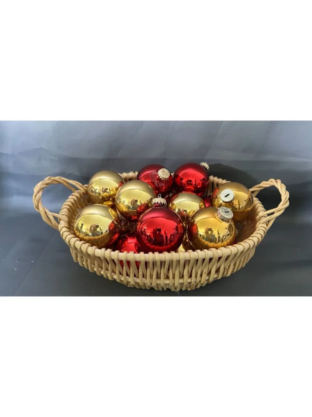 Shiny Red & Gold Christmas Ornaments In Wicker Basket